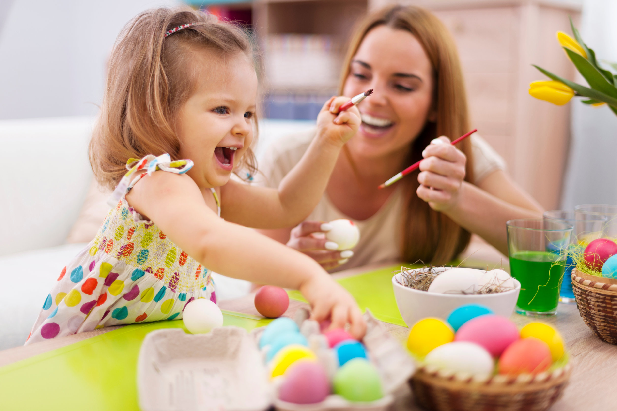 Happy time while painting easter eggs